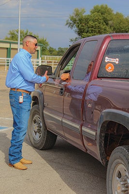 Central's CEO, Shane Burgess, interacting with a member during Central's Annual Meeting