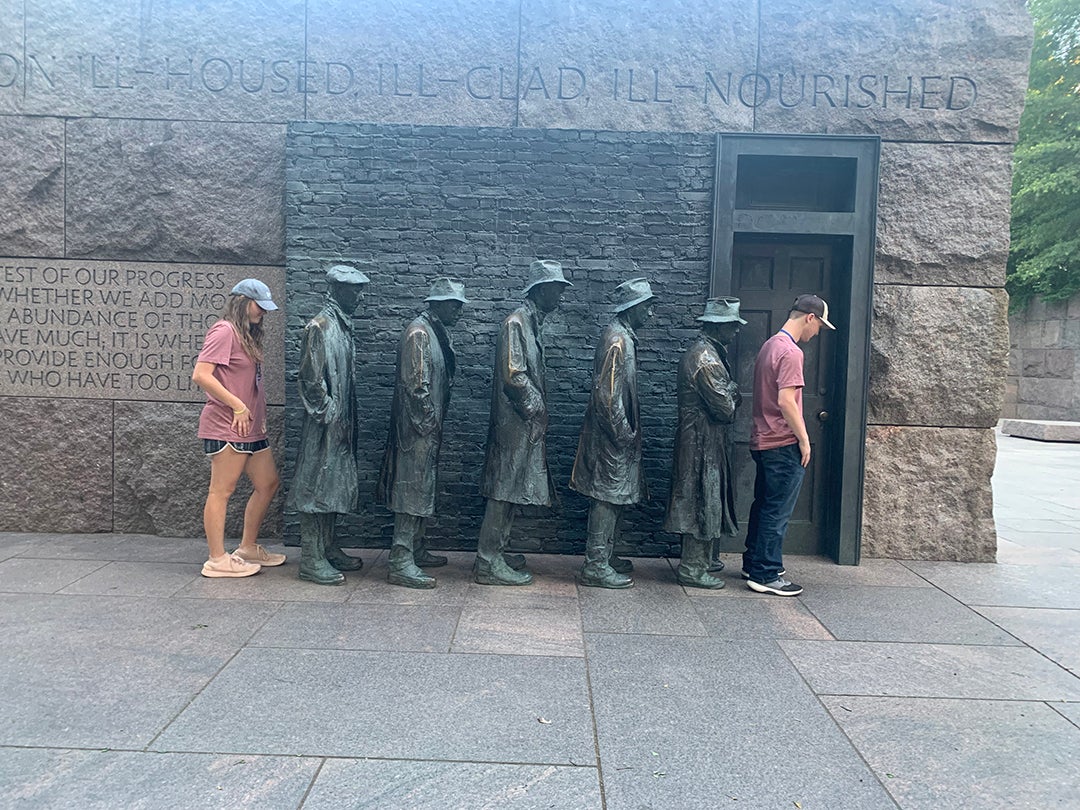 Youth Tour winners Isaac Ochsner and Bailey Ramsey visit monuments in Washington D.C. with other participants from cooperatives across the nation in June.