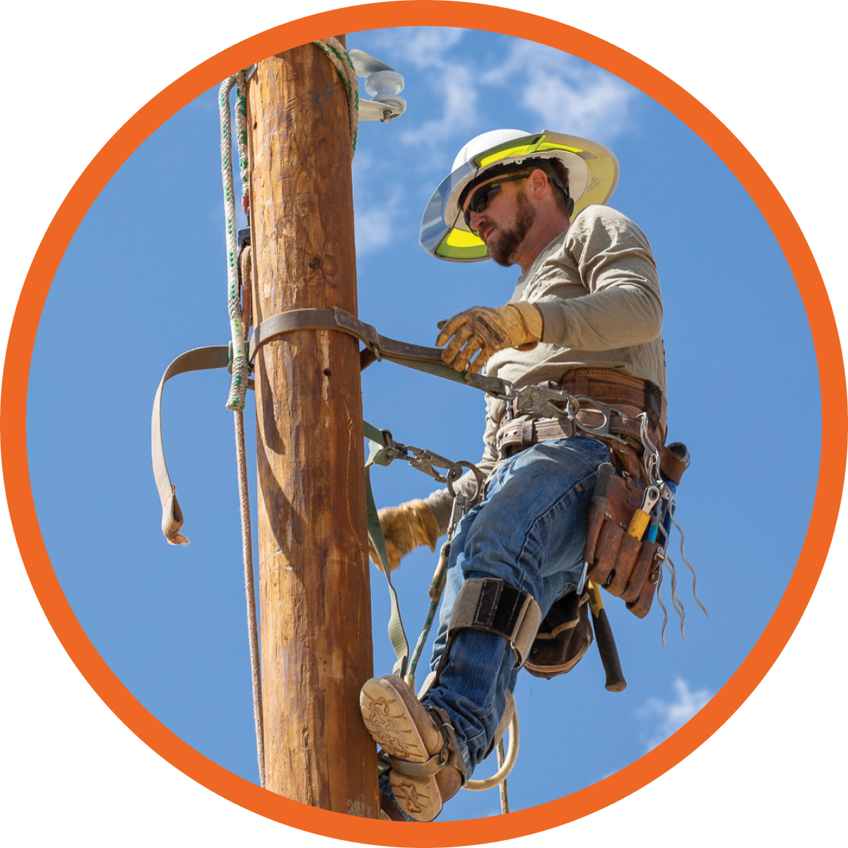 Central Lineman, Kyle Williams, working during the Light Up Navajo Project