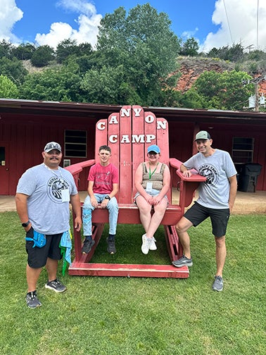 Perkins students, Robert Portman and Alina Henderson, with Central employees Larry Mattox and Dakota Fields.