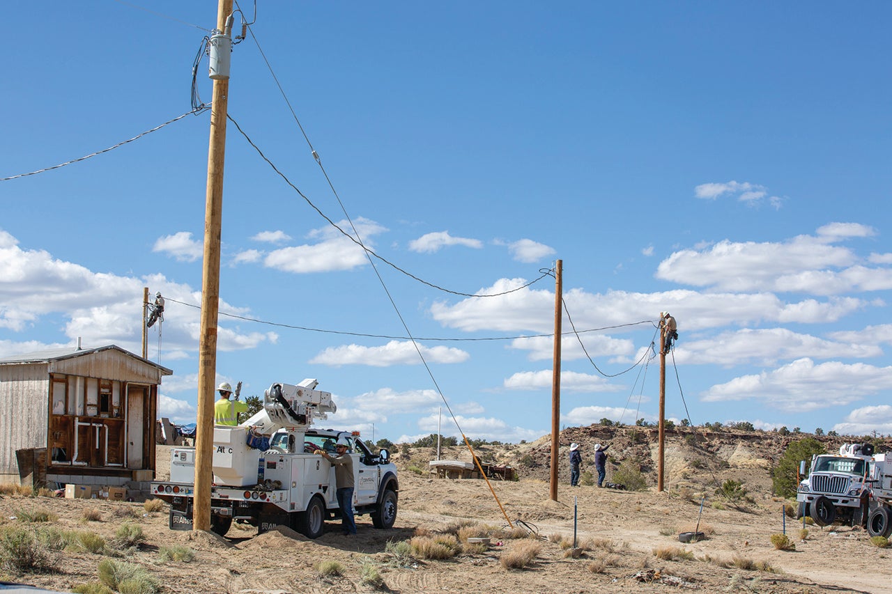 Linemen bringing electricity to New Mexico on the Light Up Navajo project.